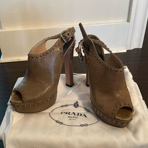 Prada heel sling back peep toe.